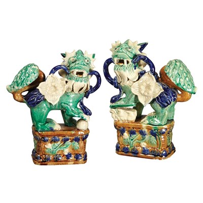 Lot 368 - Pair of Chinese Glazed Pottery Figures of Foo...