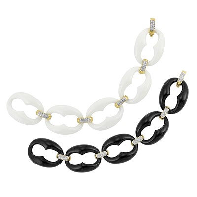 Lot 419 - Pair of Black and White Onyx, Gold and Diamond Nautical Link Bracelets