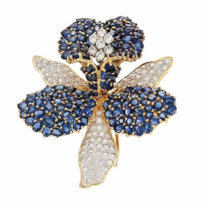 Lot 525 - Two-Color Gold, Diamond and Sapphire Flower Clip-Brooch