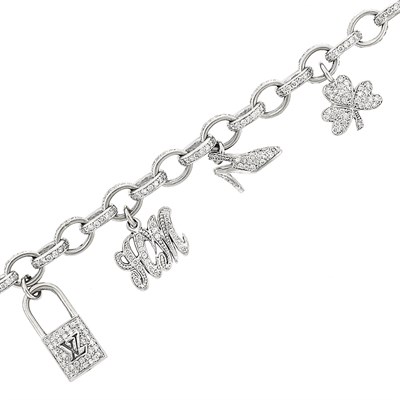 Lot 68 - White Gold and Diamond Charm Bracelet