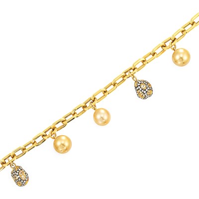 Lot 782 - Gold, Golden Cultured Pearl, Diamond and Yellow Sapphire Charm Bracelet