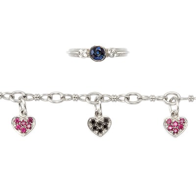Lot 630 - White Gold, Sapphire and Diamond Ring and White Gold, Ruby and Black Diamond Charm Bracelet