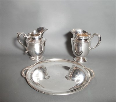 Lot 405 - Two Sterling Silver Water Pitchers; And a...