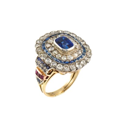 Lot 678 - Silver, Gold, Synthetic Sapphire, Diamond, Sapphire and Ruby Ring