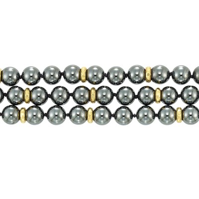 Lot 336 - Triple Strand Hematite Bead and Gold Necklace