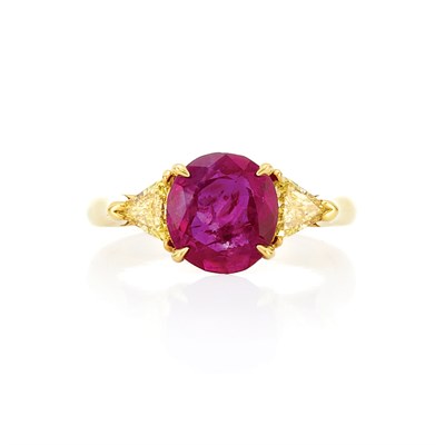 Lot 852 - Gold, Ruby and Fancy Colored Yellow Diamond Ring