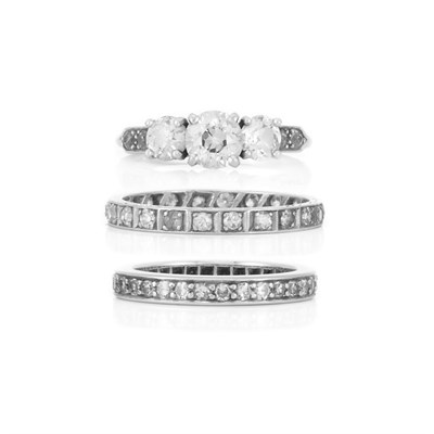 Lot 457 - Platinum and Diamond Ring and Two Diamond Guard Rings