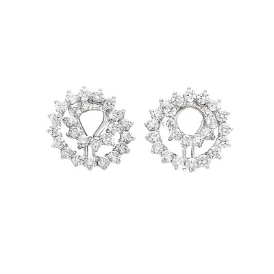 Lot 443 - Pair of Platinum and Diamond 'Swirl' Earclips, Tiffany & Co.