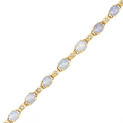 Lot 715 - Retro Gold, Gray Star Sapphire and Diamond Bracelet