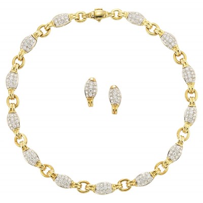 Lot 724 - Two-Color Gold and Diamond Necklace and Pair of Earclips, Craig Drake