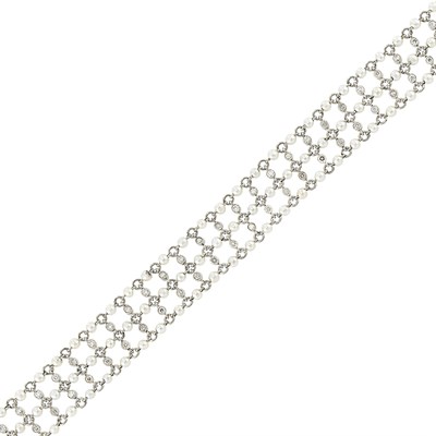 Lot 397 - Edwardian Platinum, Seed Pearl and Diamond Mesh Bracelet