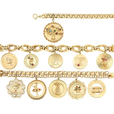 Lot 333 - Three Gold Charm Bracelets