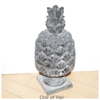 Lot 560 - Pair of Iron Pineapple-Form Garden Ornaments...