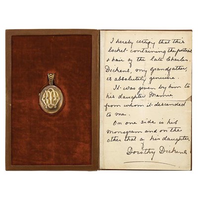 Lot 224 - DICKENS, CHARLES A locket containing the hair...