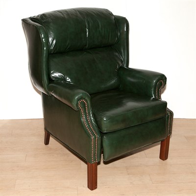 Lot 115 - Leather Upholstered Reclining Wing Chair