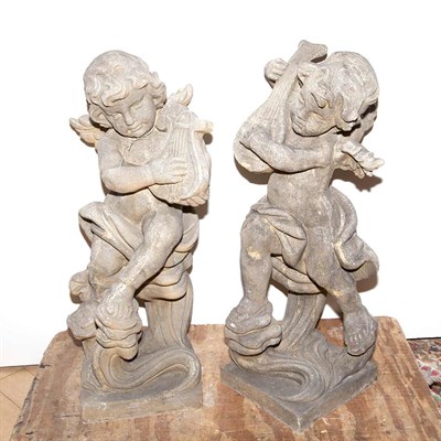 Lot 526 - Pair of Painted Composition Musical Cherub...