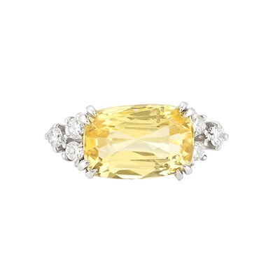 Lot 937 - Gold, Platinum, Yellow Sapphire and Diamond Ring