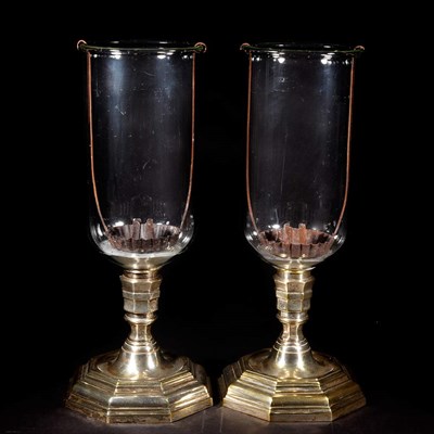 Lot 461 - Pair of Silver Plate and Glass Hurricane Lamps...