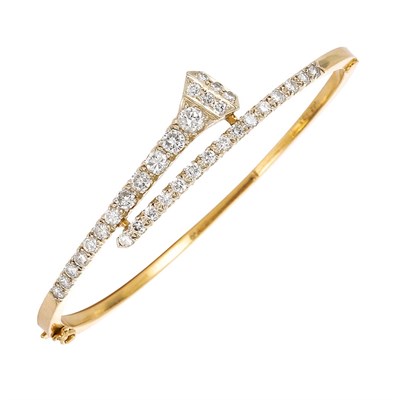 Lot 719 - Gold and Diamond Bangle Bracelet
