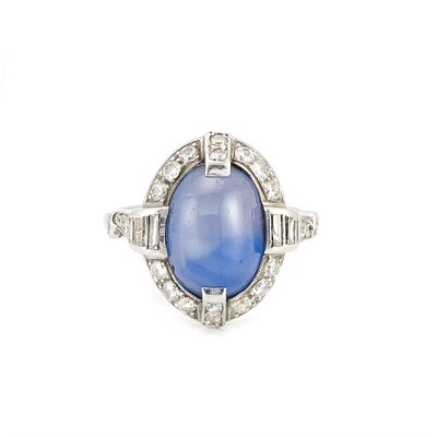 Lot 234 - Platinum, Star Sapphire and Diamond Ring