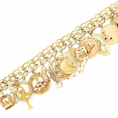 Lot 606 - Gold Charm Bracelet
