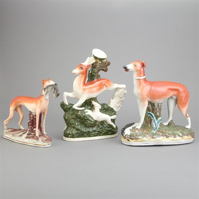 Lot 329 - Three Pairs of Staffordshire Figures of Hounds...