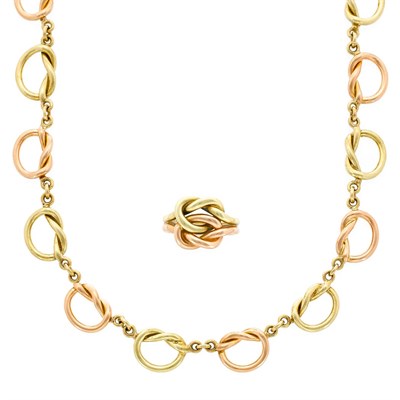 Lot 259 - Yellow and Rose Gold Knot Ring, Cartier, and Link Necklace
