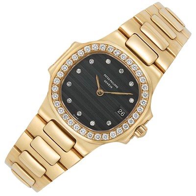 Lot 10 - Lady's Gold and Diamond 'Nautilus' Wristwatch, Patek Philippe & Co.
