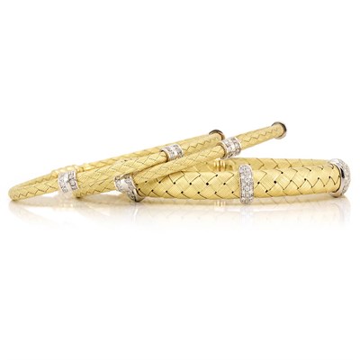 Lot 647 - Three Braided Gold Mesh and Diamond Bangle Bracelets