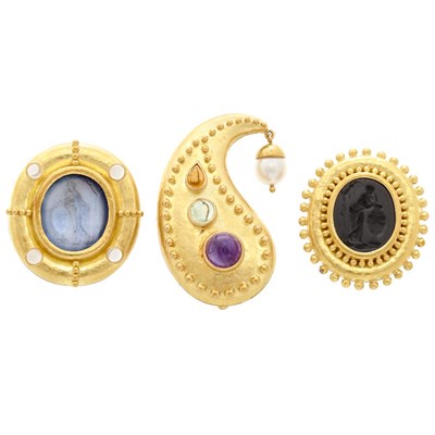 Lot 637 - Three Gold, Gem-Set, Glass Cameo and Black Onyx Intaglio Clip-Brooches, Elizabeth Locke