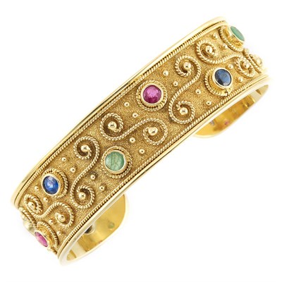Lot 754 - Gold and Gem-Set Bangle Bracelet
