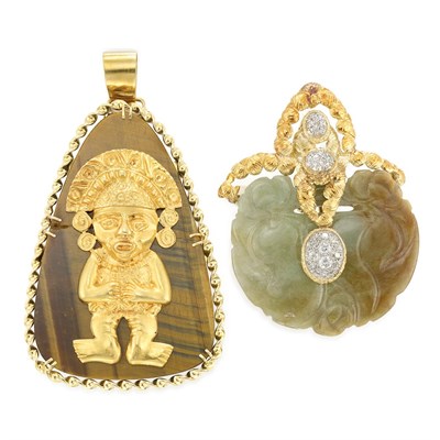 Lot 360 - Gold and Tiger's Eye Pendant Clip-Brooch and Gold, Carved Jade and Diamond Pendant-Brooch