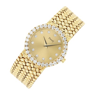 Lot 629 - Lady's Gold and Diamond Wristwatch, Piaget