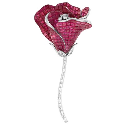 Lot 985 - White Gold, Ruby and Diamond 'en Tremblant' Flower Brooch, Alexis
