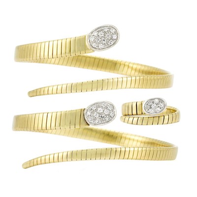 Lot 294 - Two Two-Color Gold and Diamond Coiled Bracelets and Ring