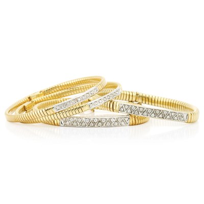 Lot 300 - Four Two-Color Gold and Diamond Snake Link Bracelets