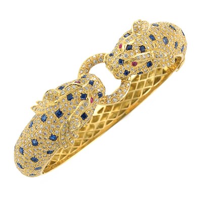 Lot 624 - Gold, Diamond, Sapphire and Ruby Leopard Bangle Bracelet