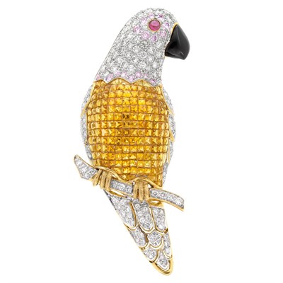 Lot 511 - Two-Color Gold, Diamond, Invisibly-Set Yellow Sapphire, Ruby and Black Enamel Parrot Clip-Brooch