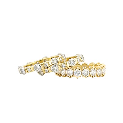 Lot 812 - Gold and Diamond Band Ring and Pair of Gold, Platinum and Diamond Band Rings