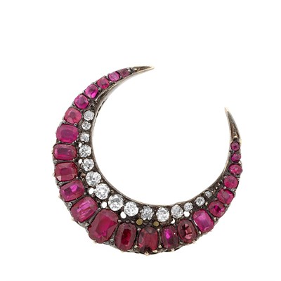 Lot 587 - Antique Silver, Gold, Ruby and Diamond Crescent Pin