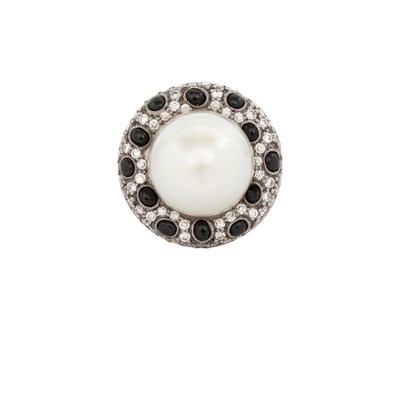 Lot 667 - Two-Color Gold, South Sea Cultured Pearl, Diamond and Black Onyx Ring