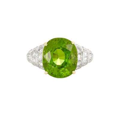 Lot 520 - Two-Color Gold, Peridot and Diamond Ring