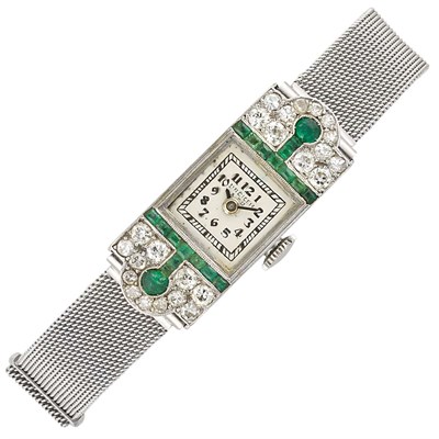 Lot 603 - Lady's Art Deco Platinum, Diamond and Emerald Mesh Wristwatch, Dreicer & Co.