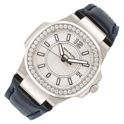 Lot 383 - Lady's White Gold and Diamond 'Nautilus' Wristwatch, Patek Philippe & Co.