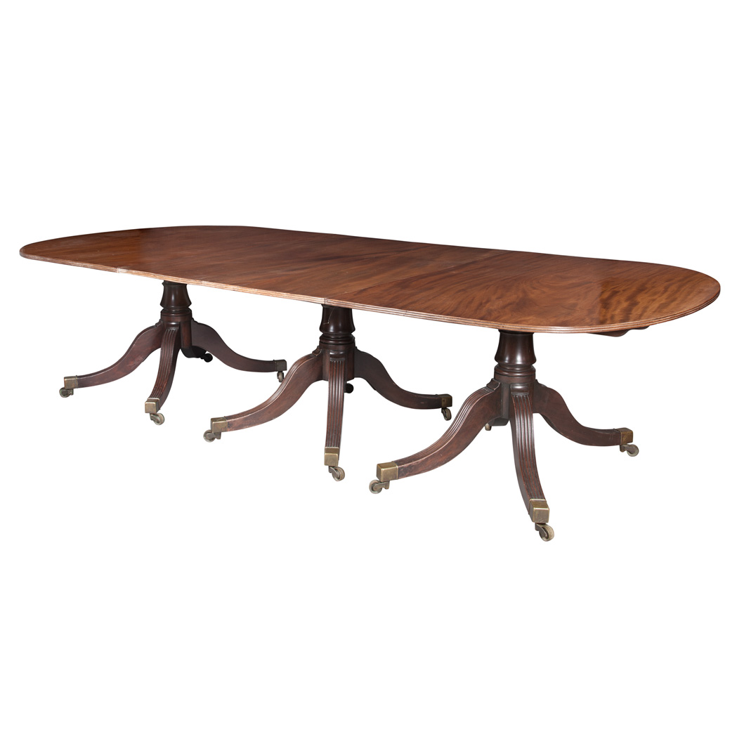 Lot 482 - Regency Mahogany Triple-Pedestal Dining Table...