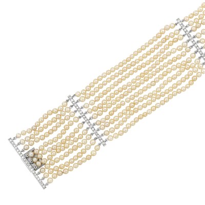 Lot 272 - Antique Nine Strand Natural Pearl, Silver and Diamond Bracelet