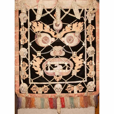 Lot 191 - Southeast Asian Bone and Tapestry Necromantic...