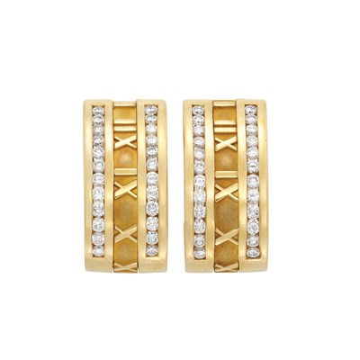 Lot 195 - Pair of Gold and Diamond 'Atlas' Hoop Earclips, Tiffany & Co.