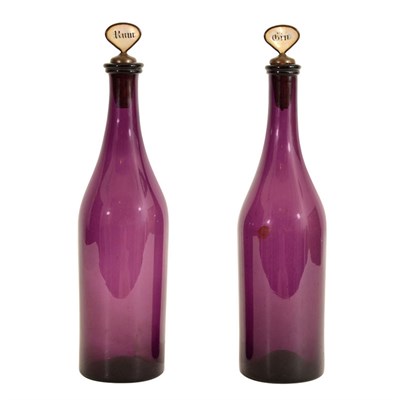 Lot 54 - Pair of Amethyst Glass Decanters 19th Century...