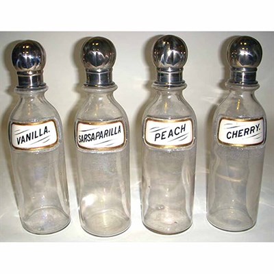 Lot 410 - Set of Four Glass Soda Fountain Bottles with...